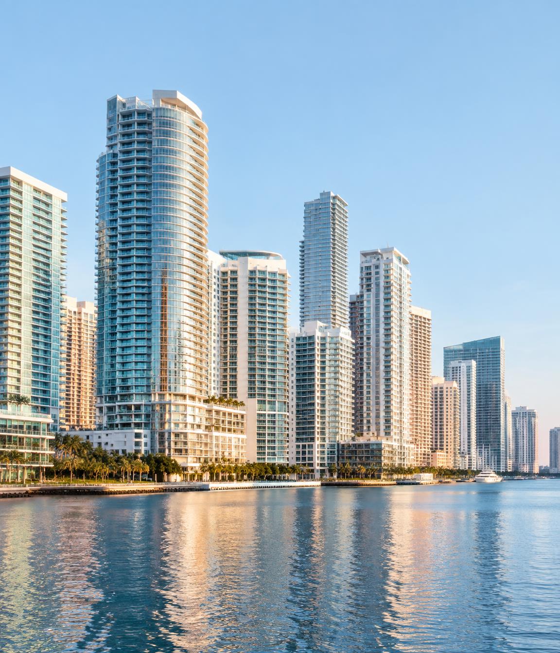 Contemporary Brickell condo towers along the blue waters of Biscayne Bay